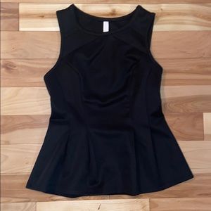 Black peplum sleeveless top